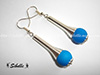 Boucles d'oreilles tourbillon perle bleue