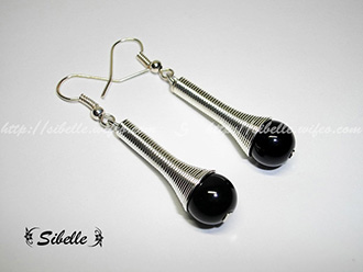 Boucles d'oreilles tourbillon perle noire