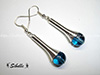 Boucles d'oreilles tourbillon perle bleue marine