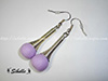 Boucles d'oreilles tourbillon perle mauve