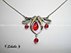 Collier perles rouges
